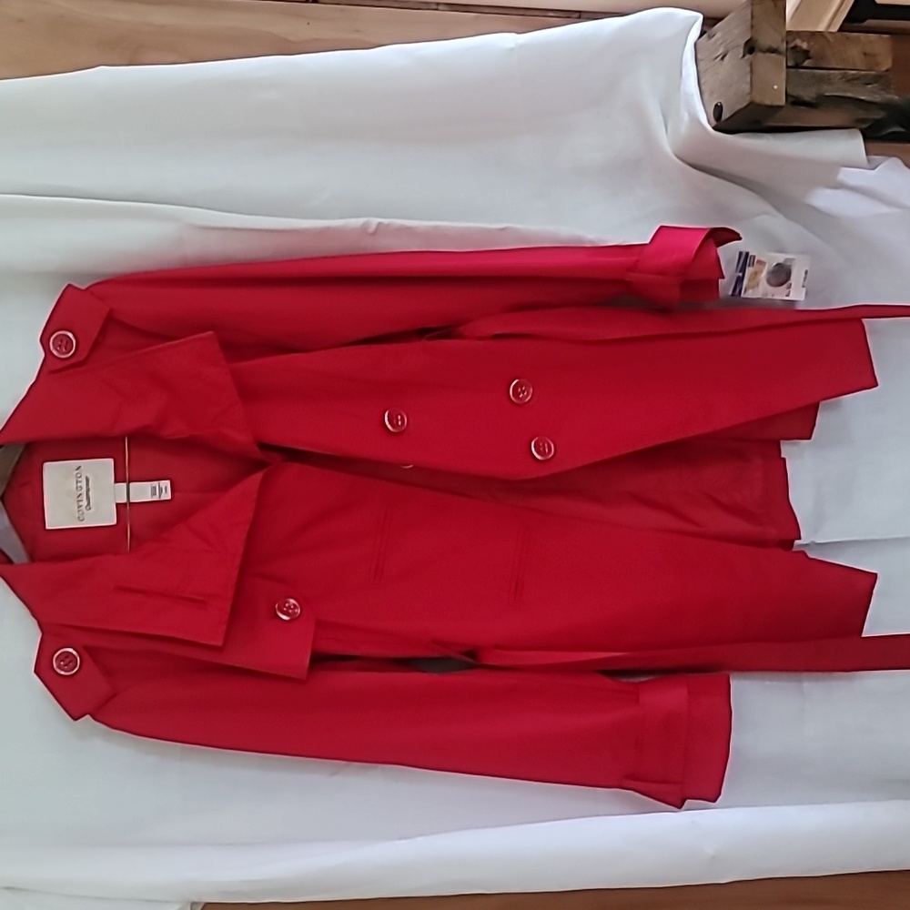 A red rain coat new with tags, size XL
